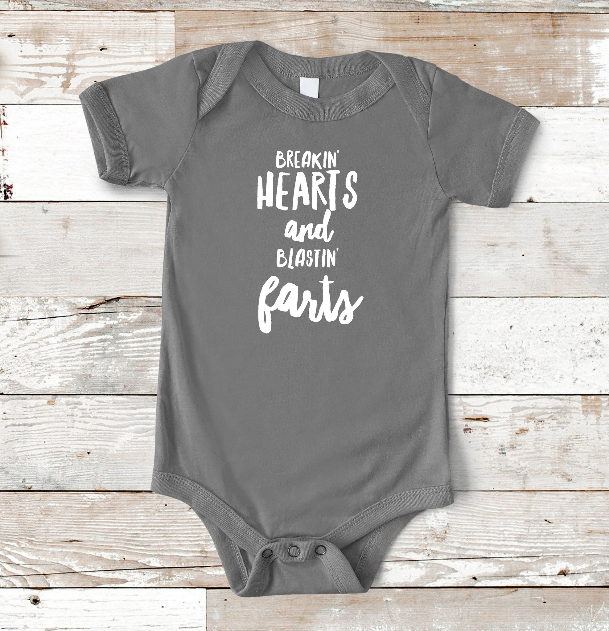 HEARTS AND FARTS ONESIE