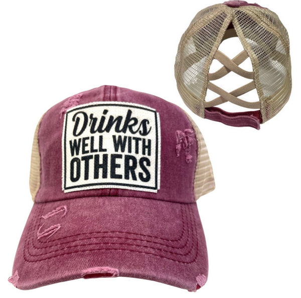 DRINKS WELL WITH OTHERS CRISS-CROSS PONYTAIL HAT